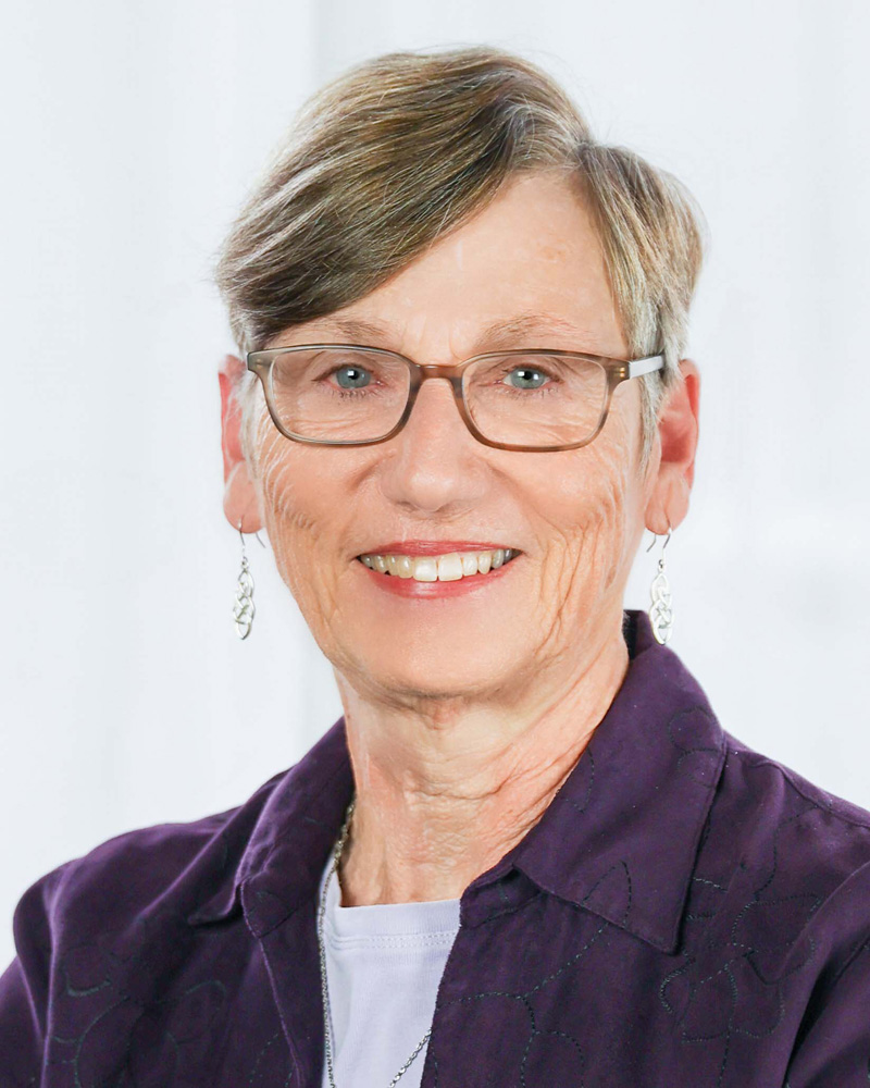 LSPA Staff Member Poses for headshot.